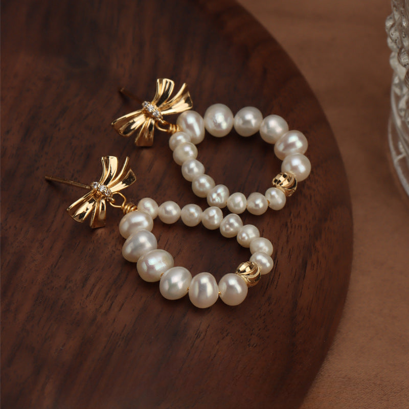 Bow pearl stud earrings