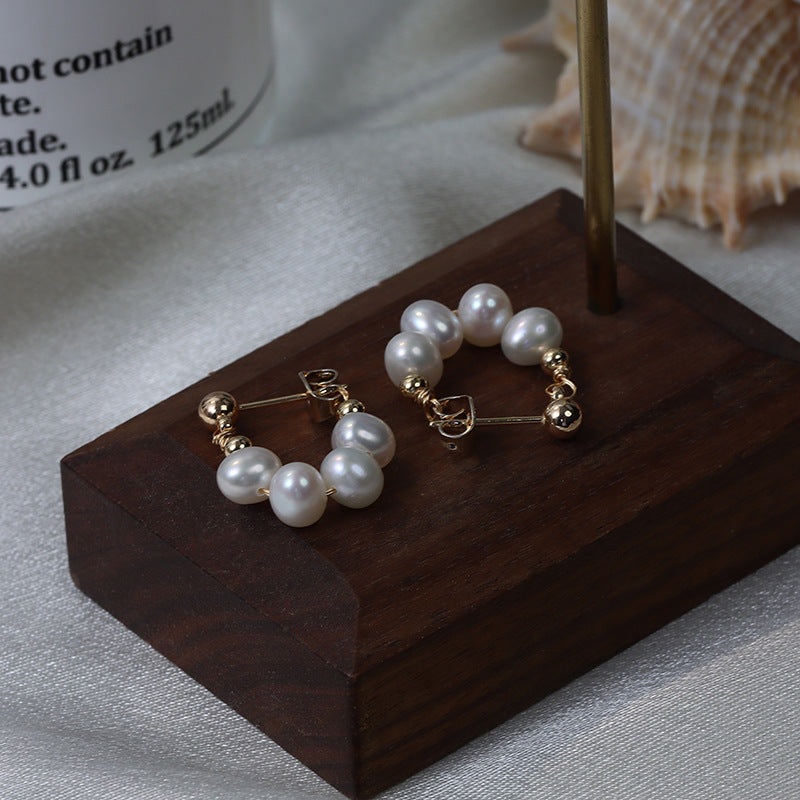 One pair of freshwater pearl earrings.