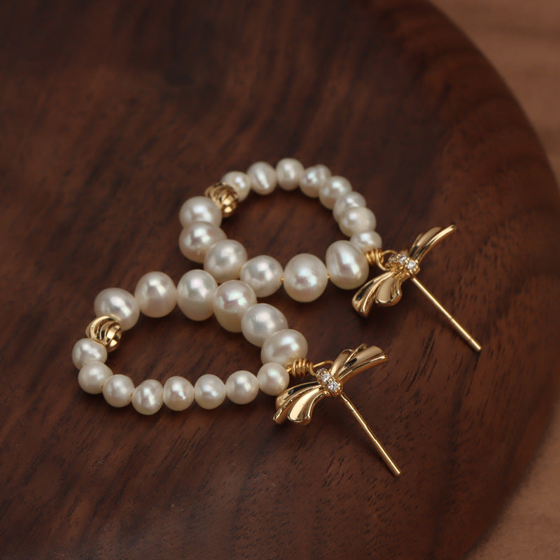 Bow pearl stud earrings