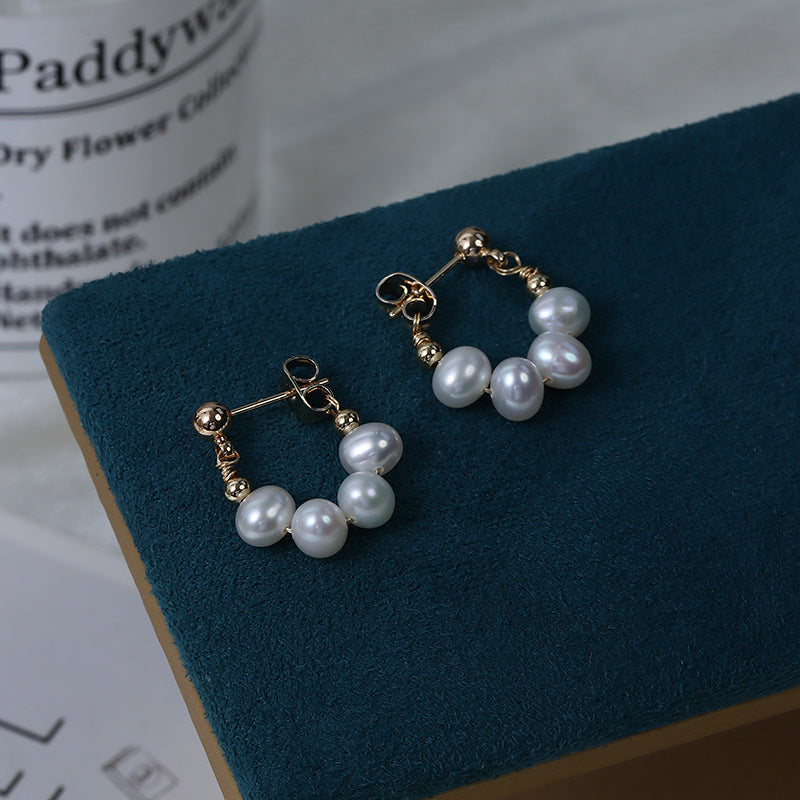One pair of freshwater pearl earrings.