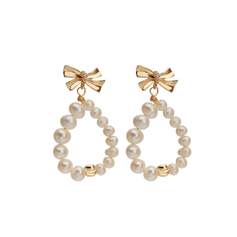 Bow pearl stud earrings