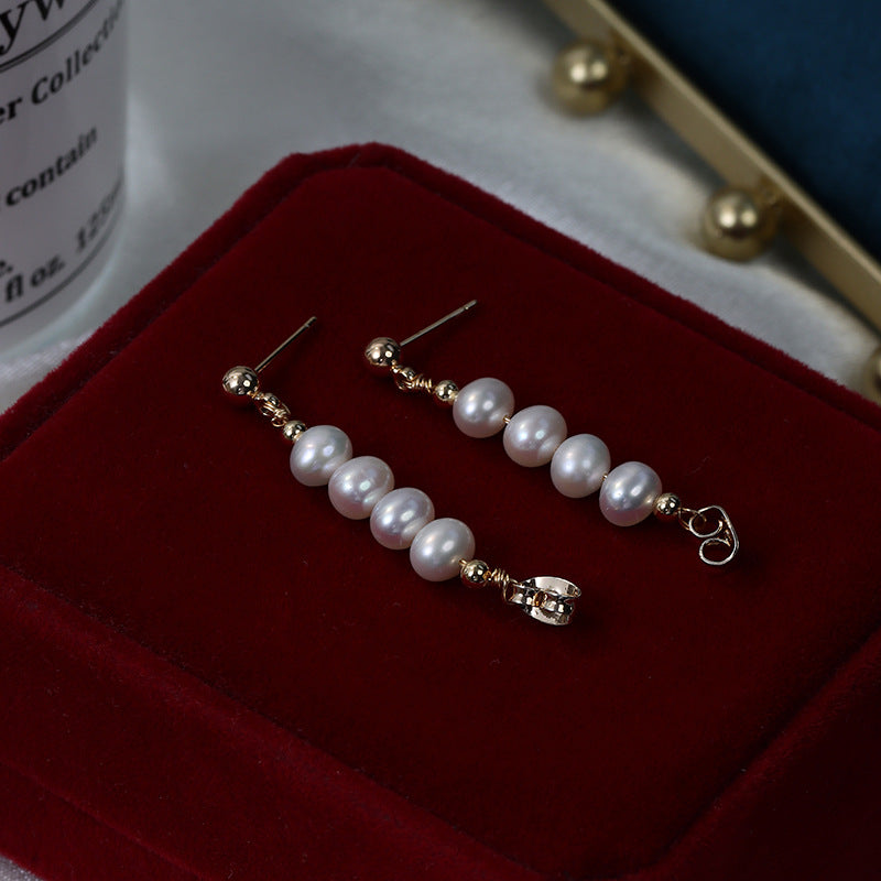 One pair of freshwater pearl earrings.