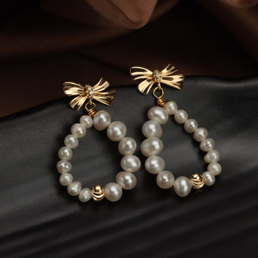 Bow pearl stud earrings