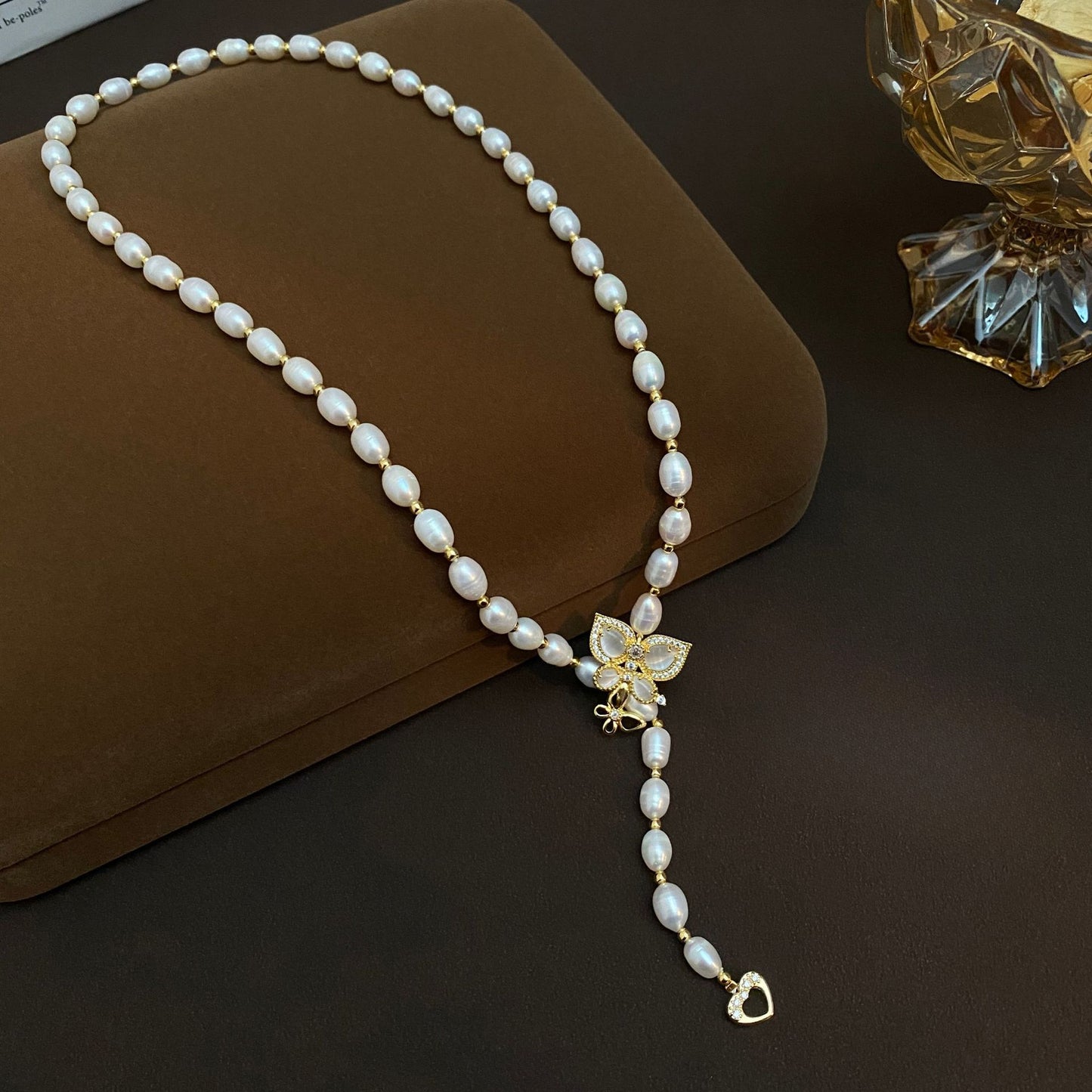 Natural pearl long butterfly temperament sweater chain